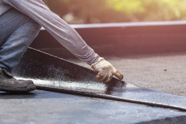 Professional Exterior Waterproofing technician working in Saint Johns, MI